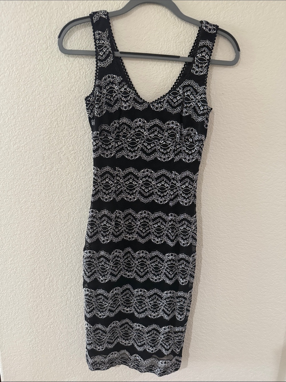 Mystic Black Dress with White Lace-Style Pattern